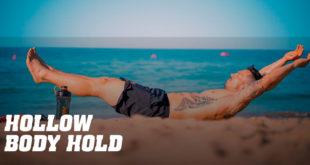 Hombre en la arena haciendo ejercicio Hollow Hold