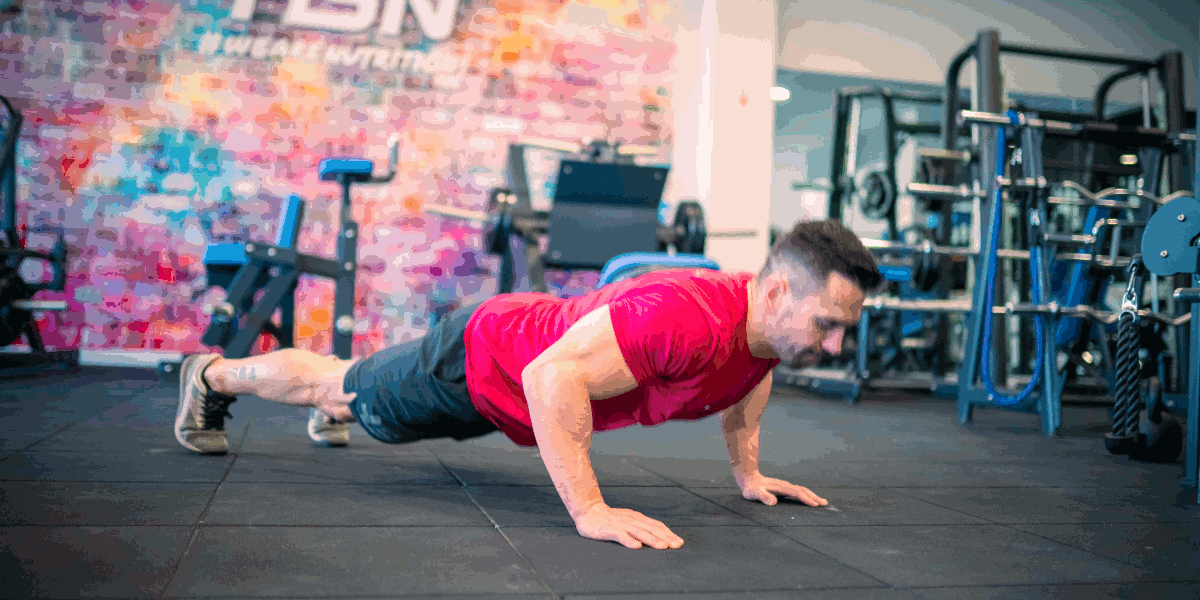 Flexión con palmada