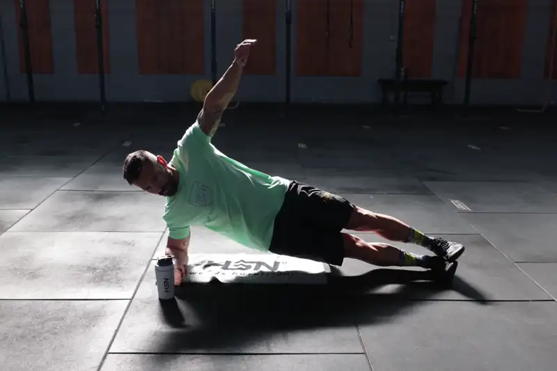 Plancha lateral con giro ruso